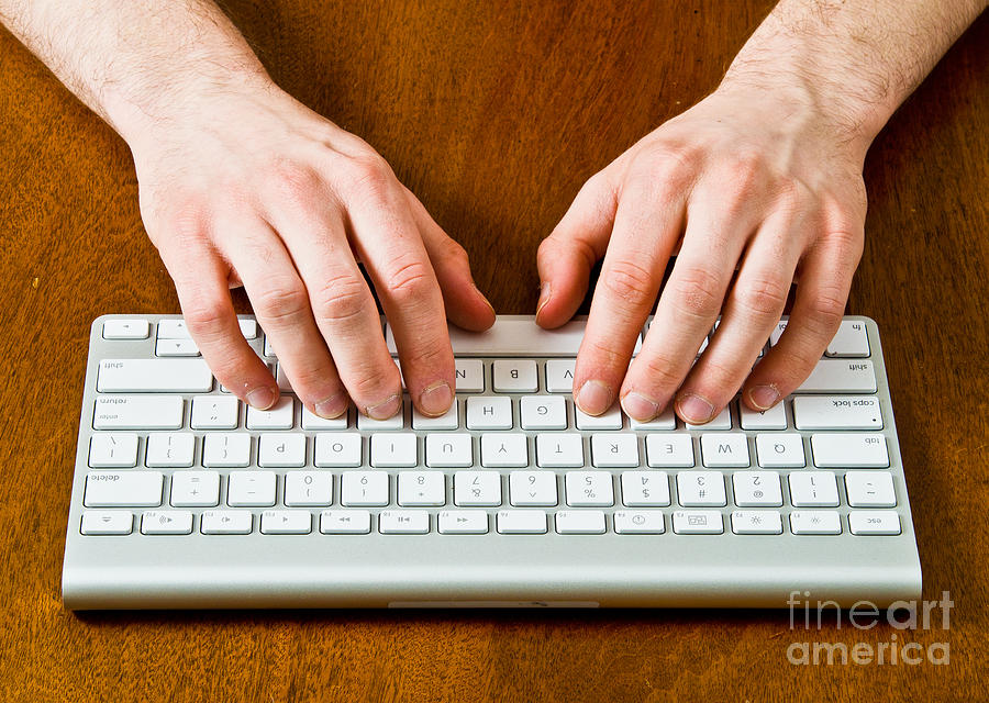 Typing On A Wireless Keyboard #3 Photograph by Photo Researchers