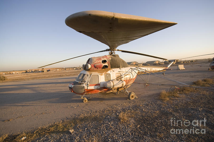 Helicopter Photograph - An Iraqi Helicopter Sits On The Flight #4 by Terry Moore
