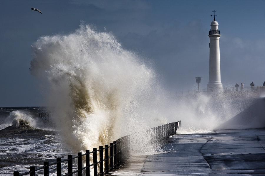 Waves Crashing By Lighthouse At Photograph by John Short