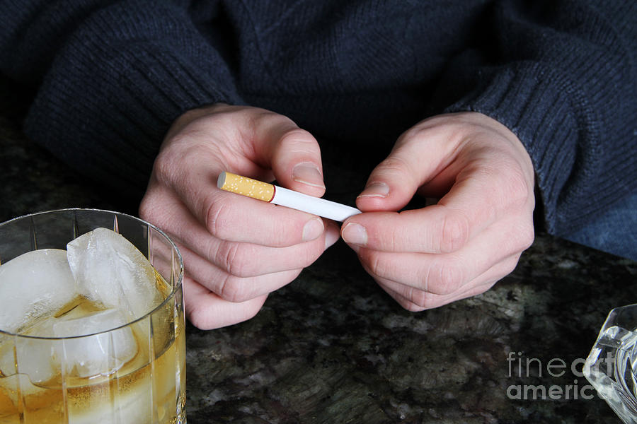 Alcohol And Cigarettes #5 Photograph by Photo Researchers