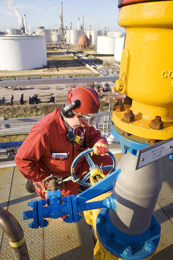 Oil Refinery Worker Photograph by Paul Rapson - Pixels