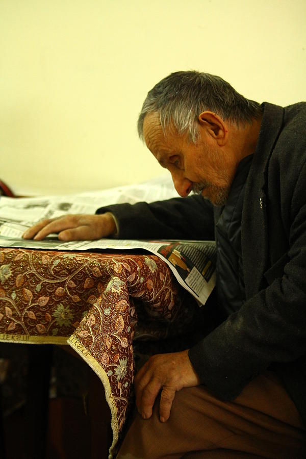 90 Years Old Man Reads Newspaper Photograph by Armagan Portakal - Fine ...