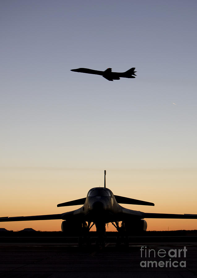 A B-1b Lancer Takes Off At Sunset Photograph by HIGH-G Productions