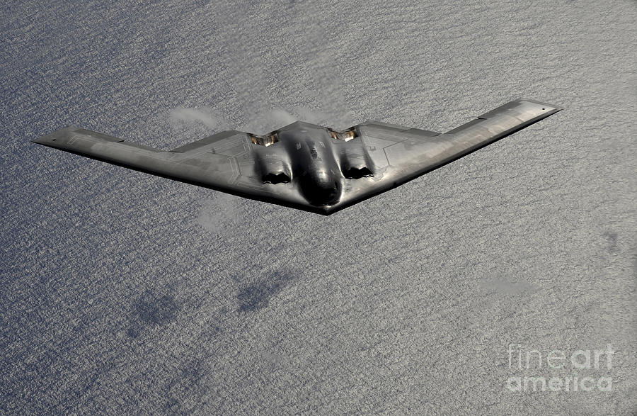 A B-2 Spirit Flies Over The Pacific Photograph by Stocktrek Images ...