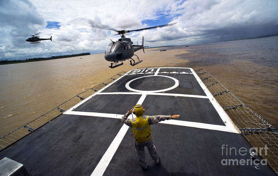 Transportation Photograph - A Brazilian Eurocopter Prepares To Land by Stocktrek Images