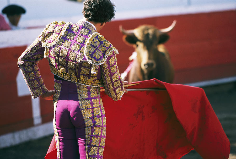 A Bullfighter Holds His Red Cape Photograph by Pablo Corral Vega