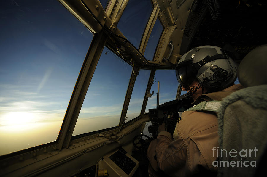 A C-130 Hercules Pilot Scans Photograph by Stocktrek Images
