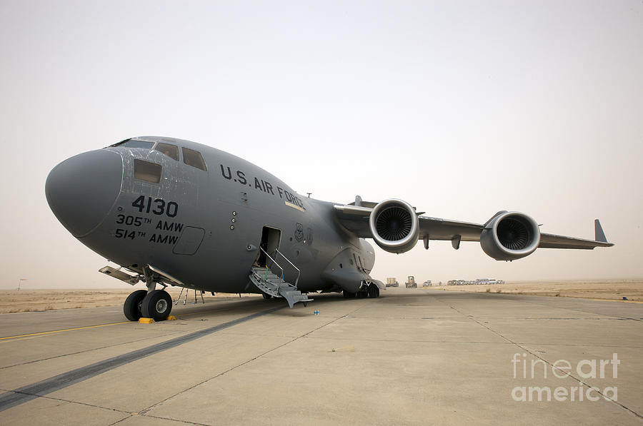 A C-17 Globemaster IIi Sits Photograph by Terry Moore
