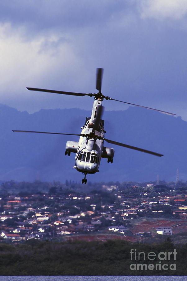 A Ch-46 Sea Knight Helicopter In Flight Photograph by Michael Wood ...