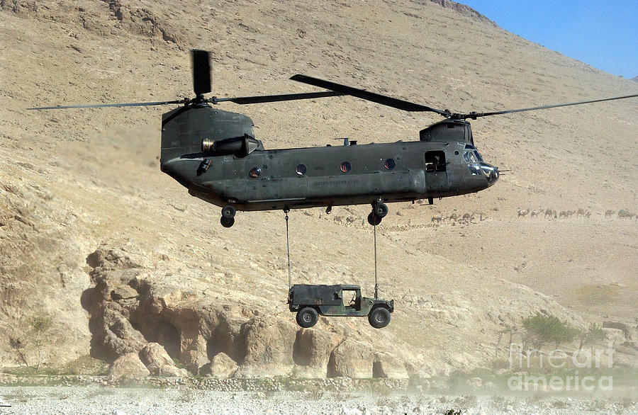 A Ch-47 Chinook Transports Photograph by Stocktrek Images