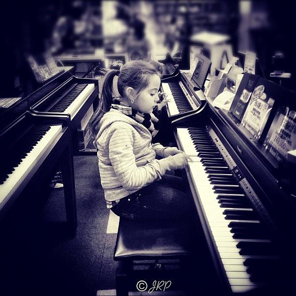 A Child In Her Own Musical World... My Photograph by Julianna Rivera-Perruccio