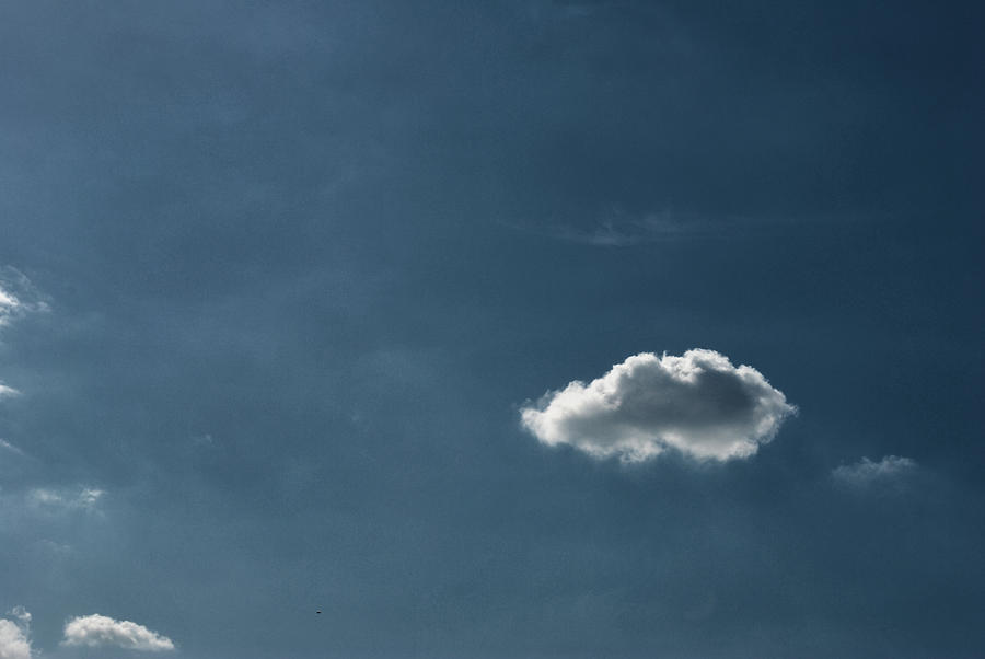 Clouds Photograph - A cloud on a sunny day by Sumit Mehndiratta