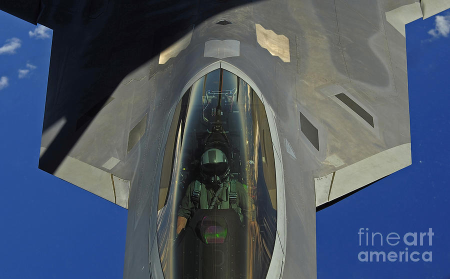 Jet Photograph - A F-22 Raptor Receives Fuel by Stocktrek Images