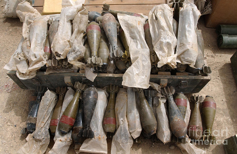 A Group Of Mortar Rounds Photograph by Stocktrek Images | Fine Art America