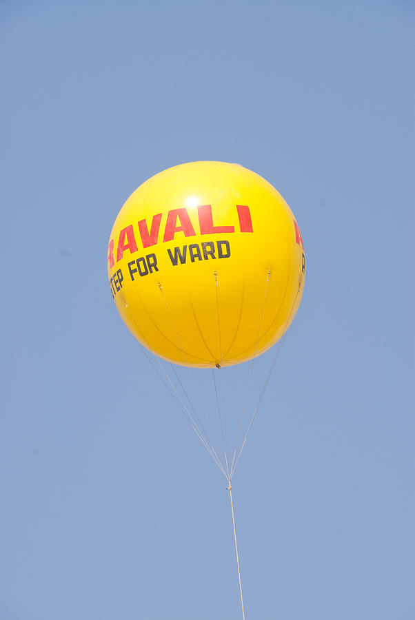 A hot air balloon in the blue sky Photograph by Ashish Agarwal
