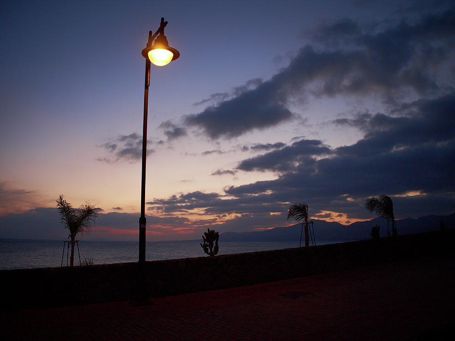 A Lamp By The Sea Photograph