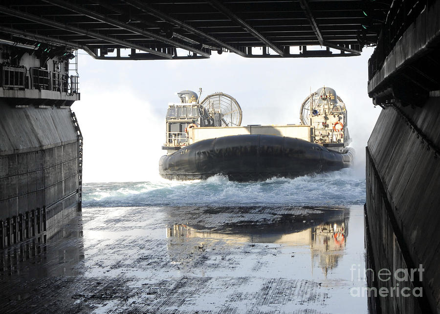 Boat Photograph - A Landing Craft Air Cushion Prepares by Stocktrek Images