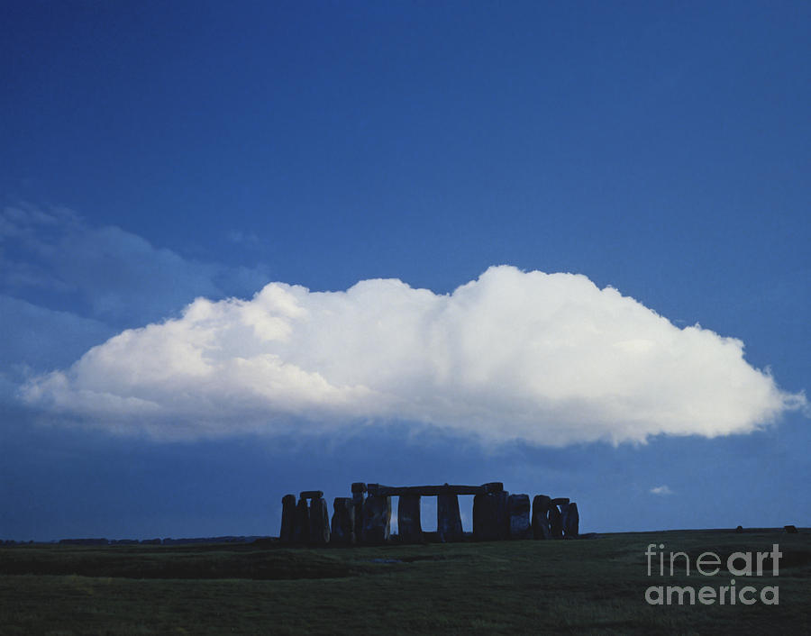 Architecture Photograph - A Large Cloud Over Stonehenge by Stocktrek Images