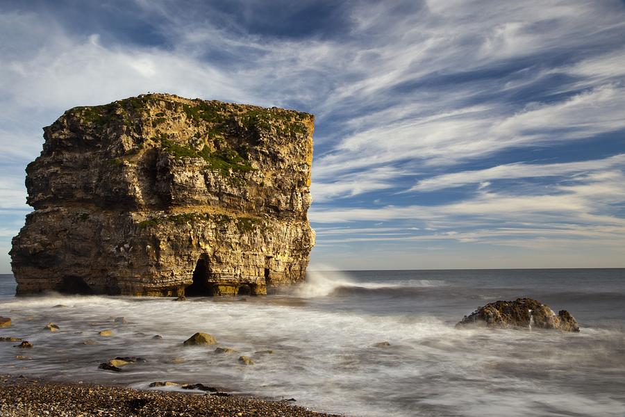 A Large Rock Formation Off The Coast Photograph by John Short | Fine ...