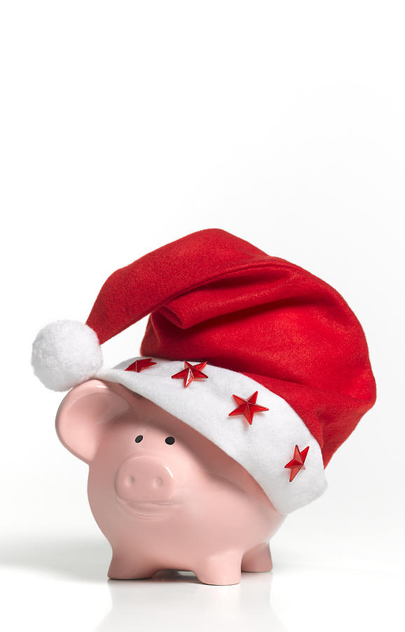 A Piggy Bank Wearing A Santa Hat Photograph by Peter Dazeley A Piggy Bank Wearing A Santa Hat Photograph by Peter Dazeley