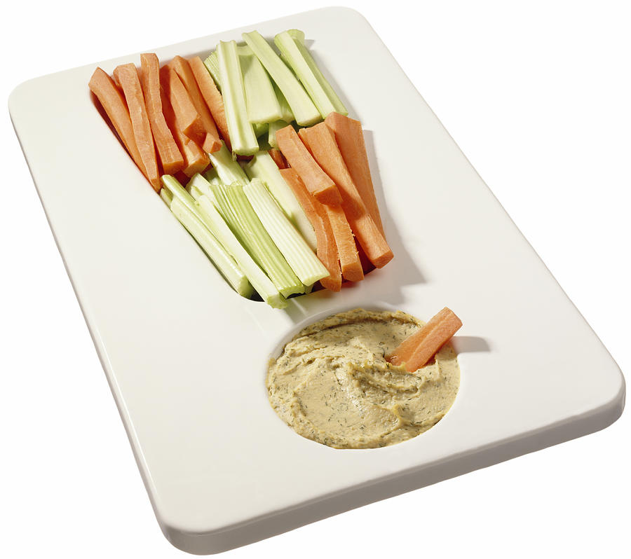 A Platter With Hummus, Carrot And Celery Sticks Photograph by Steve