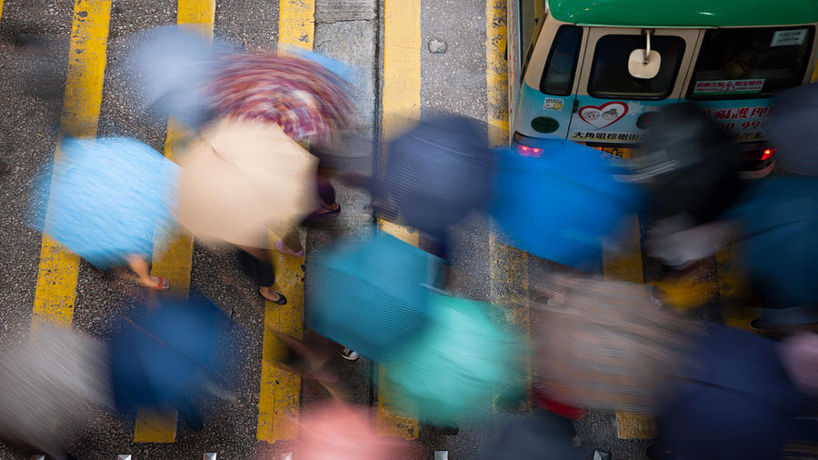 Umbrella Photograph - A rainy day  by Kam Chuen Dung