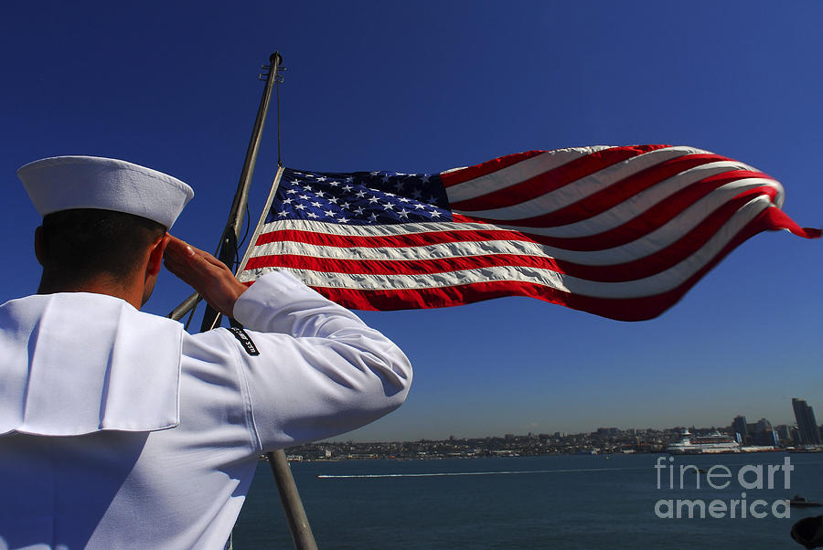 A Sailor Salutes The American Flag Photograph by Stocktrek Images - Pixels