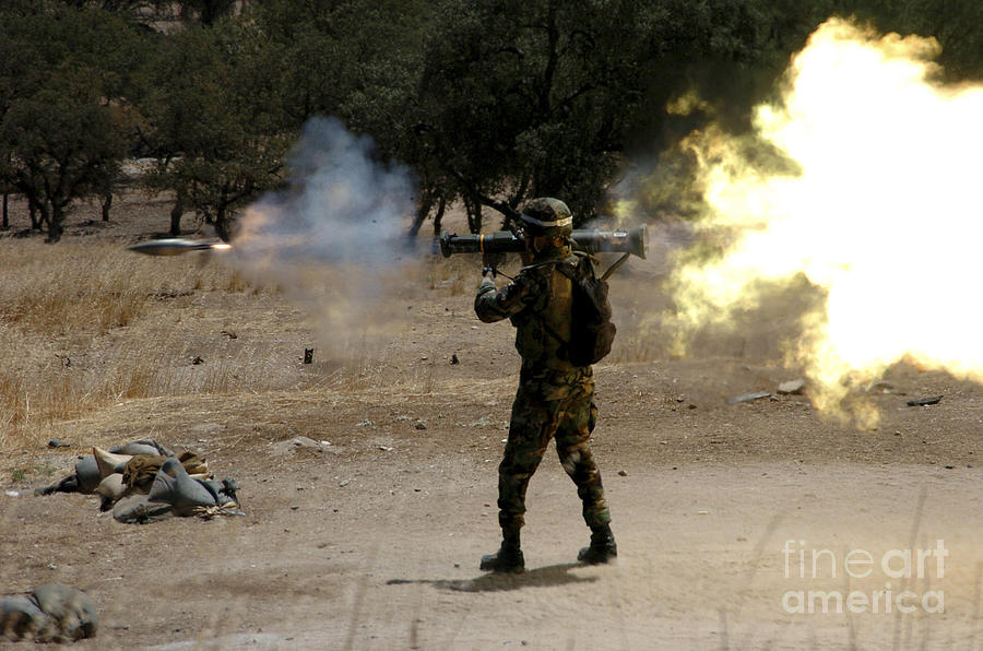 A Soldier Fires A M136 At-4 Rocket Photograph by Stocktrek Images