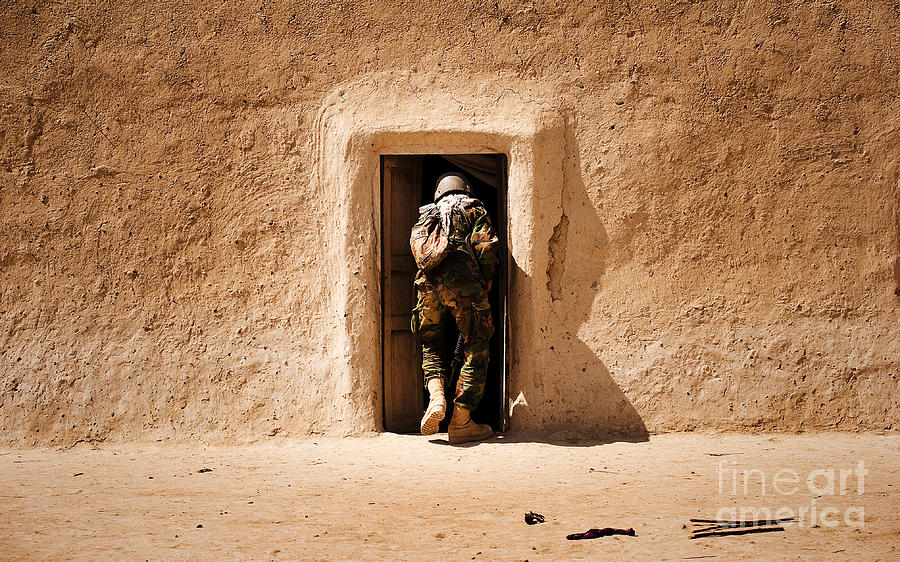 Full Frame Photograph - A Squad Leader Searches The Room by Stocktrek Images