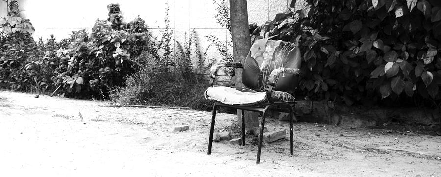 Black And White Photograph - A torn chair by Sumit Mehndiratta