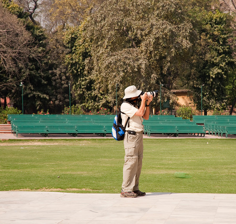 A tourist using a high powered camera inside the Red Court in New Delhi Photograph by Ashish Agarwal
