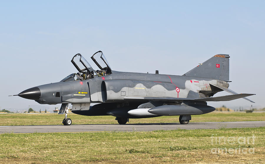 Transportation Photograph - A Turkish Air Force Rf-4e Taxiing by Giovanni Colla