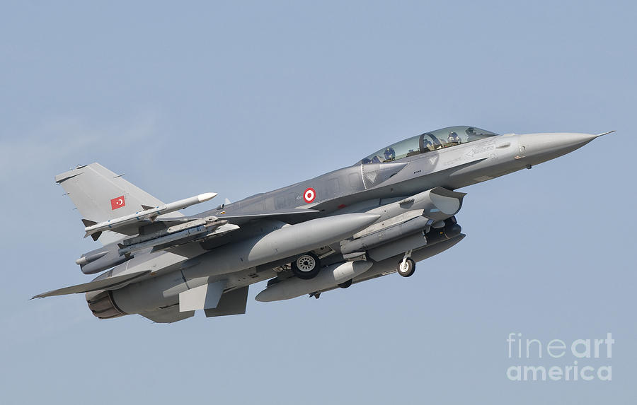 Transportation Photograph - A Turkish-built F-16 In Flight by Giovanni Colla