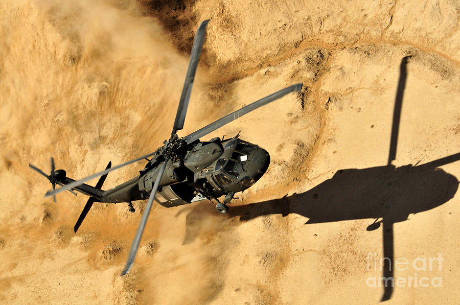 A Uh-60 Black Hawk Helicopter Comes Photograph