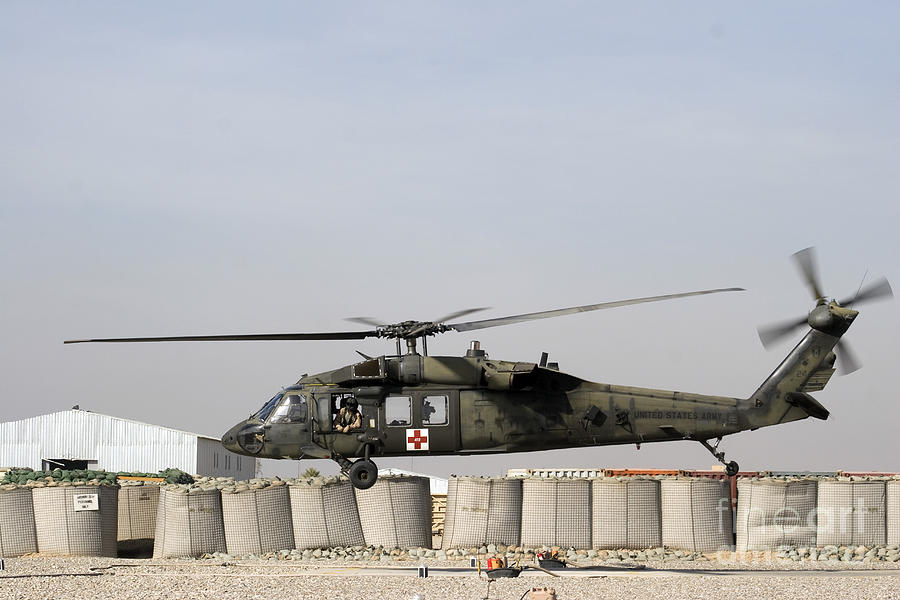 A Uh-60 Blackhawk Prepares To Land Photograph by Terry Moore