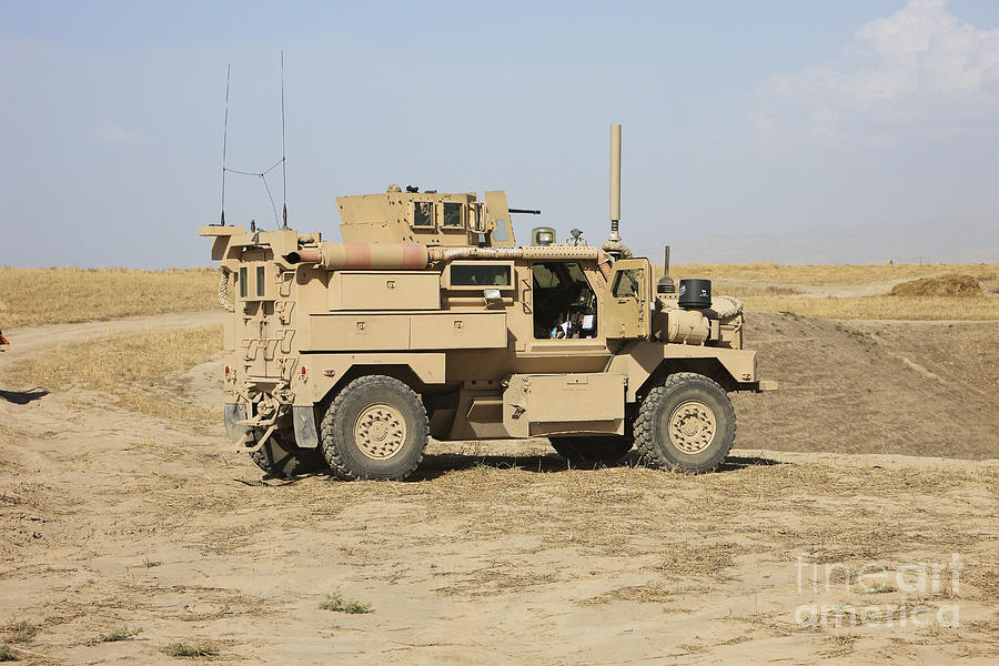 Transportation Photograph - A U.s. Army Cougar Mrap Vehicle by Terry Moore