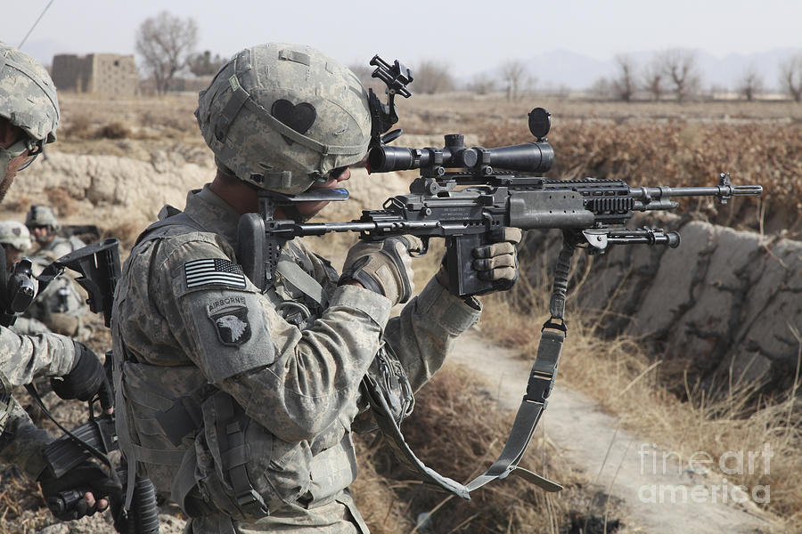 A U.s. Army Soldier Looks Photograph by Stocktrek Images