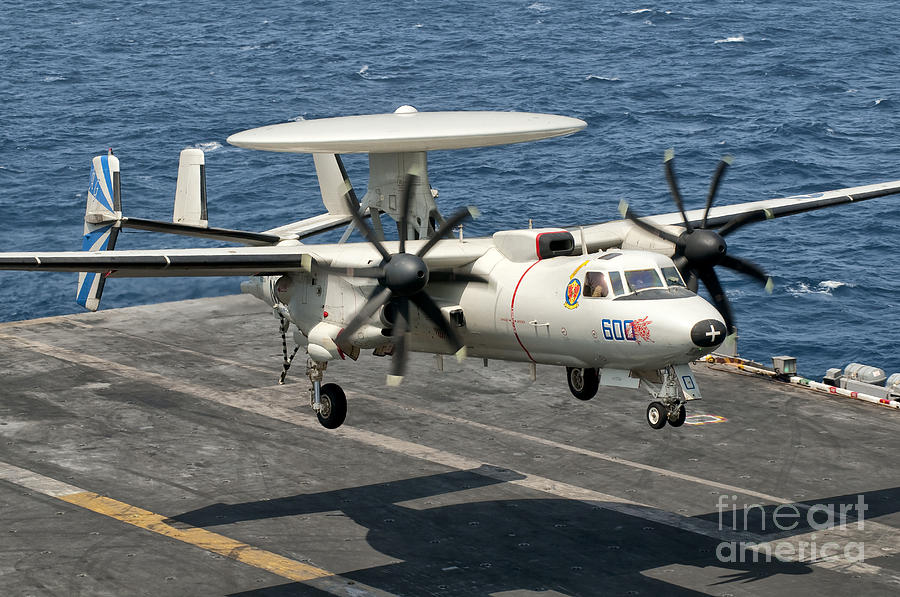 Transportation Photograph - A Us Navy E-2c Hawkeye Prepares To Land by Giovanni Colla