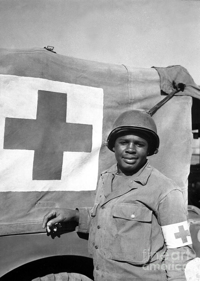 A World War II Soldier Stands Next Photograph by Stocktrek Images