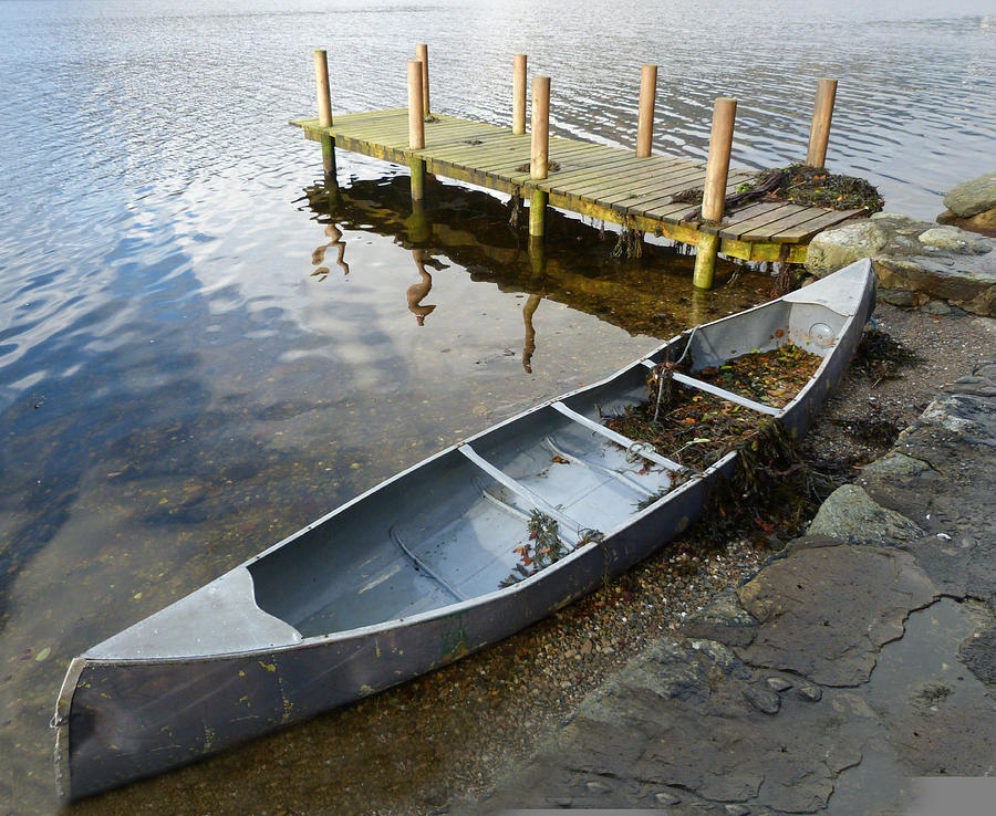 Abandoned Canoe Photograph by Lynn Bolt