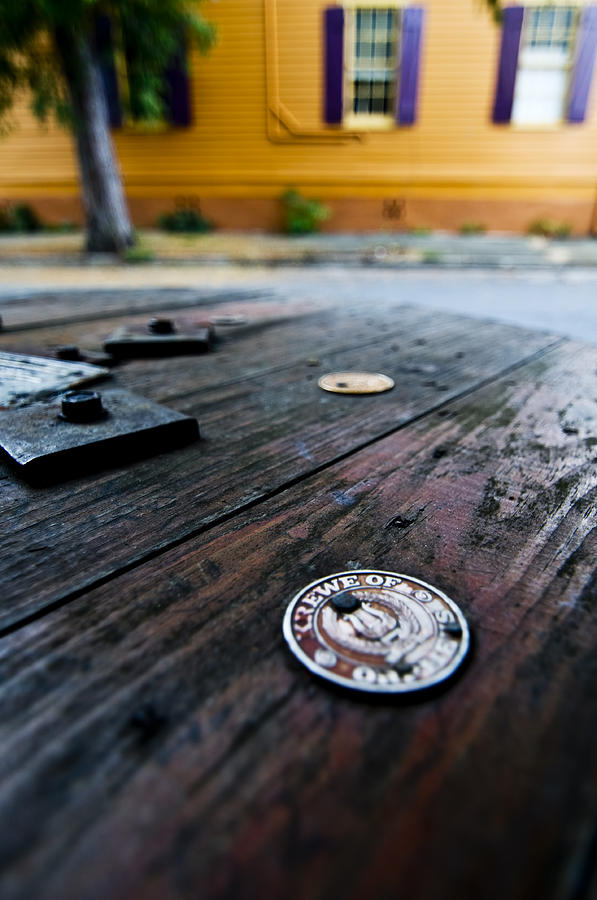 Abstract Coin on Table Photograph by Ray Laskowitz