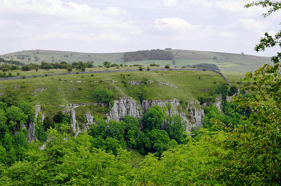 Across Cressbrook Dale to Ravens Crag Photograph by Rod Johnson