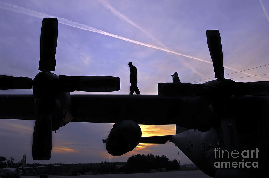 Airman Performs A Pre-flight Inspection Photograph by Stocktrek Images