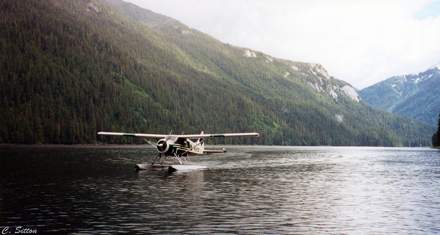 Airplane on Lake Photograph by C Sitton