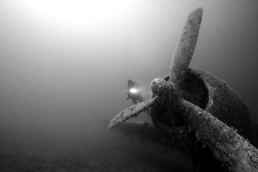 Airplane Underwater Photograph by Rico Besserdich