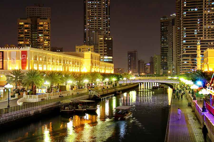 Al Qasba Canal At Night Photograph by Hussein Kefel - Fine Art America