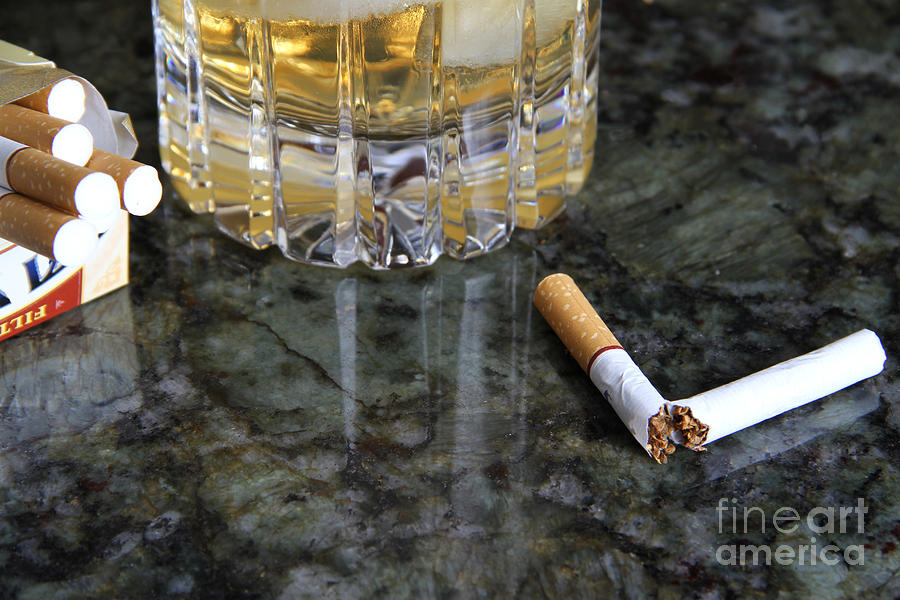 Alcohol And Cigarettes Photograph by Photo Researchers