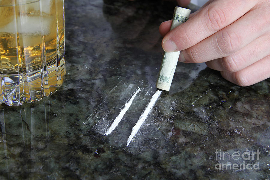 Alcohol And Cocaine Photograph by Photo Researchers