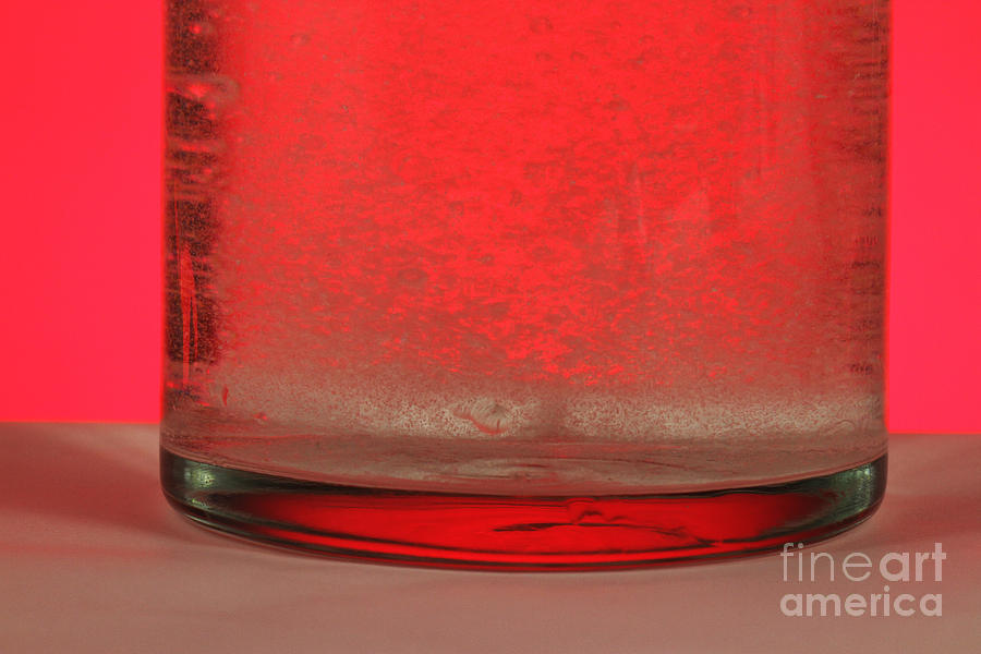 Alka-seltzer Dissolving In Water Photograph by Photo Researchers, Inc.