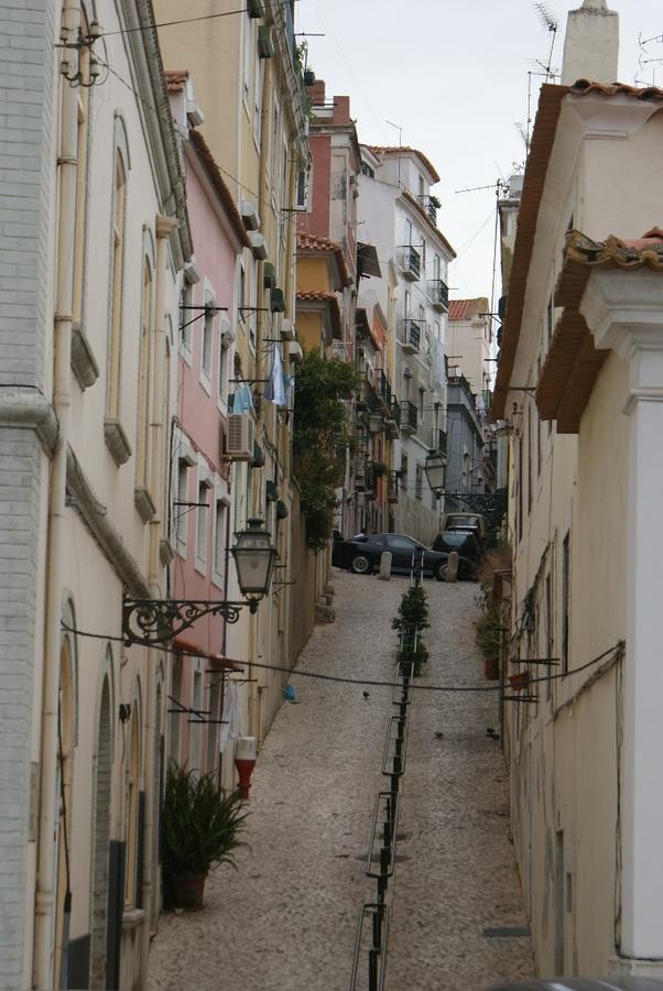 Lisbon Photograph - Alleyways of Lisbon by Irina Zelichenko
